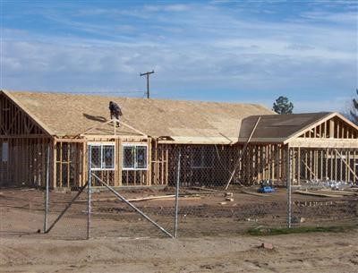 15743 Rancherias Road Apple Valley, CA 92307 - Photo 1 of 1 a front view of a house with a porch