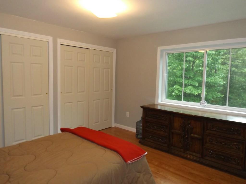 19 Wards Road Otis, ME 04605 - Photo 18 of 30 Bedroom 2: large windows and two...