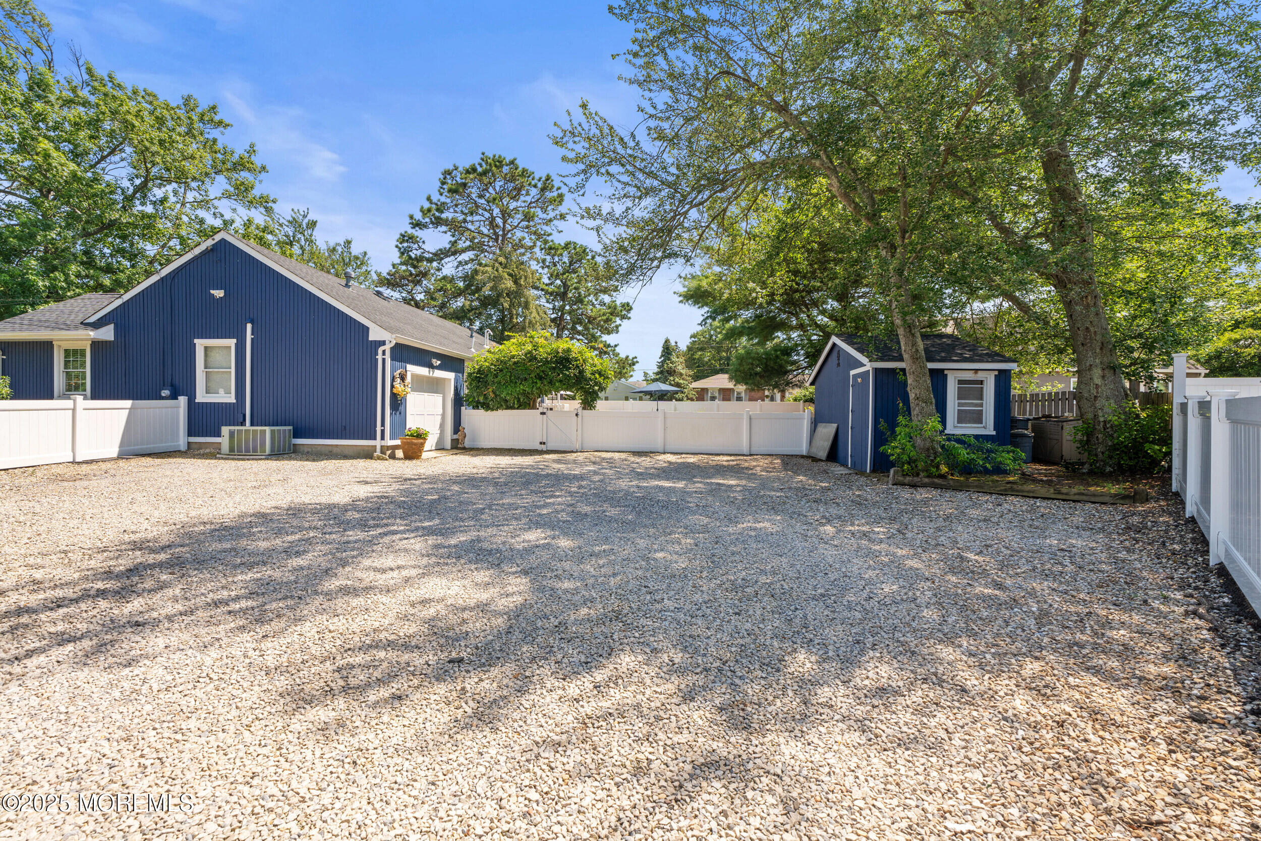 611 Drum Point Road Brick, NJ 08723 - Photo 28 of 35 a view of a house with a yard