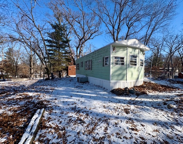 12-44&45 Woodhaven Sublette, IL 61367 - Photo 2 of 5 a front view of a house with a yard