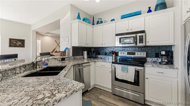 $569,000 | 36 Monarch Cove Court, Unit 1A, Lake Ozark, MO 65049