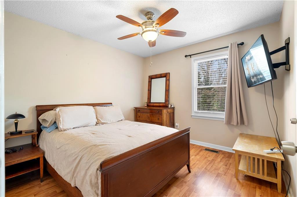 30 Azalea Drive Southeast Cartersville, GA 30121 - Photo 21 of 35 a bed room with a bed and a window