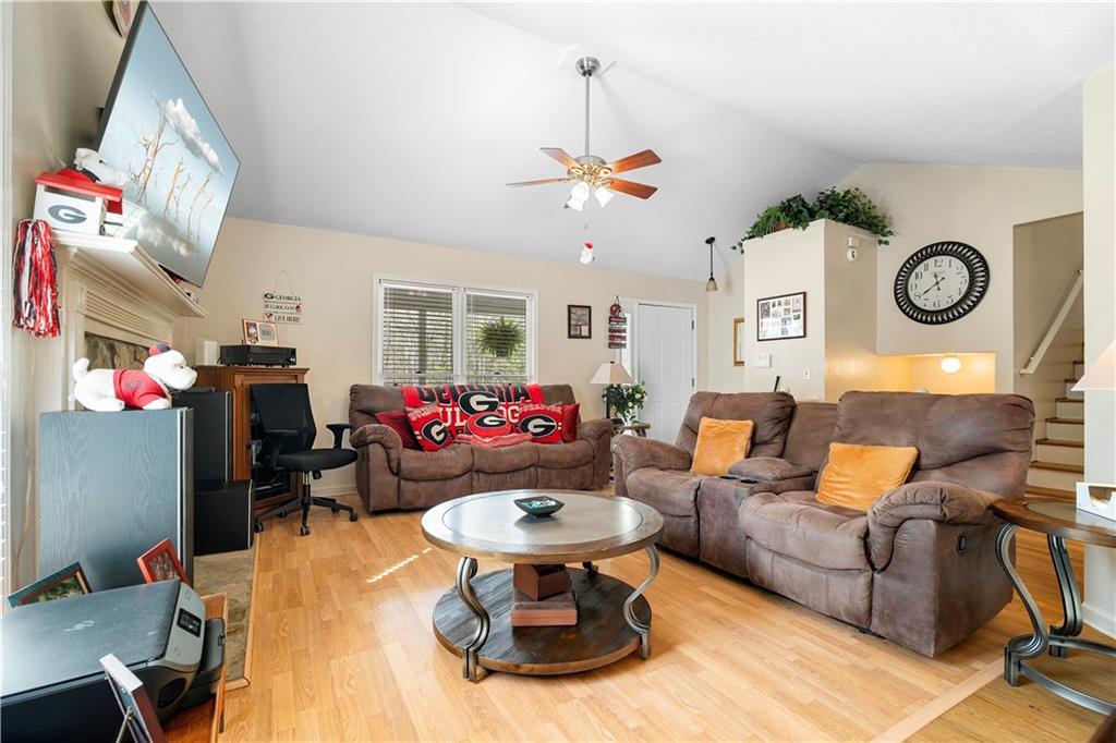 30 Azalea Drive Southeast Cartersville, GA 30121 - Photo 5 of 35 a living room with furniture and a chandelier