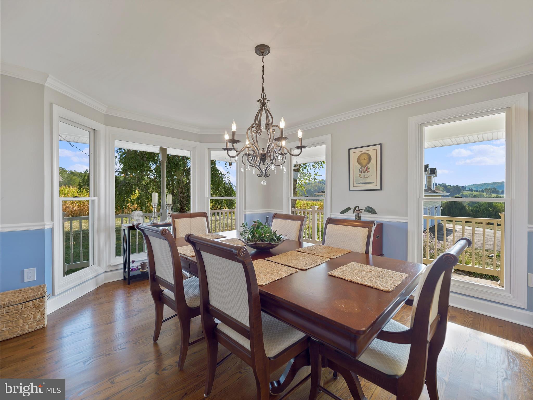 10306 Church Hill Road Myersville, MD 21773 - Photo 14 of 81 a dining room with furniture a chandelier and wooden floor
