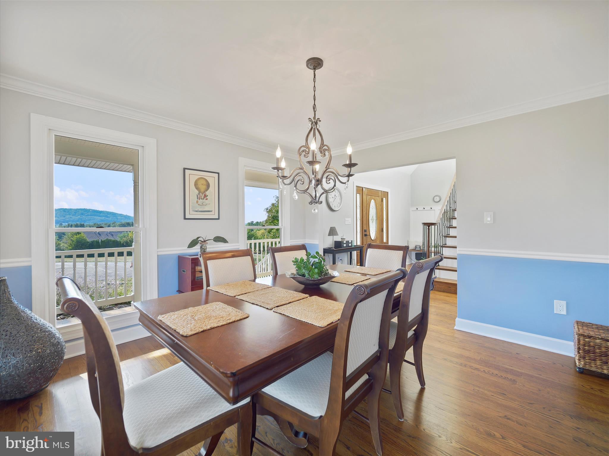 10306 Church Hill Road Myersville, MD 21773 - Photo 15 of 81 a view of a dining room with furniture window and wooden floor