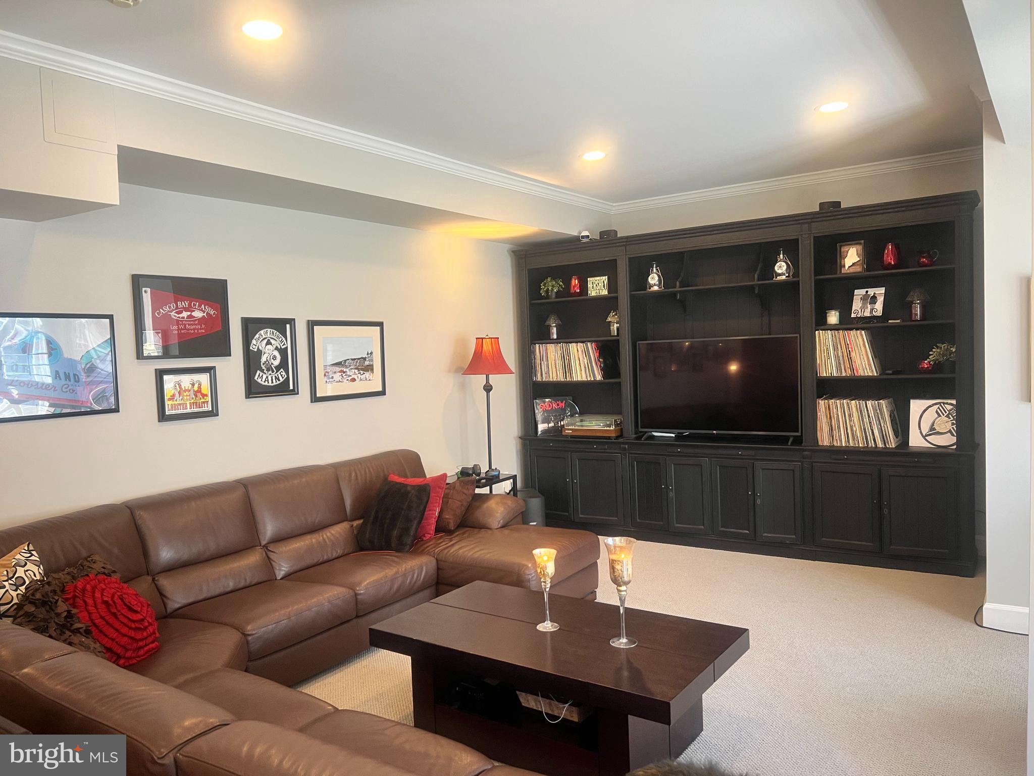 10306 Church Hill Road Myersville, MD 21773 - Photo 35 of 81 a living room with furniture and a flat screen tv