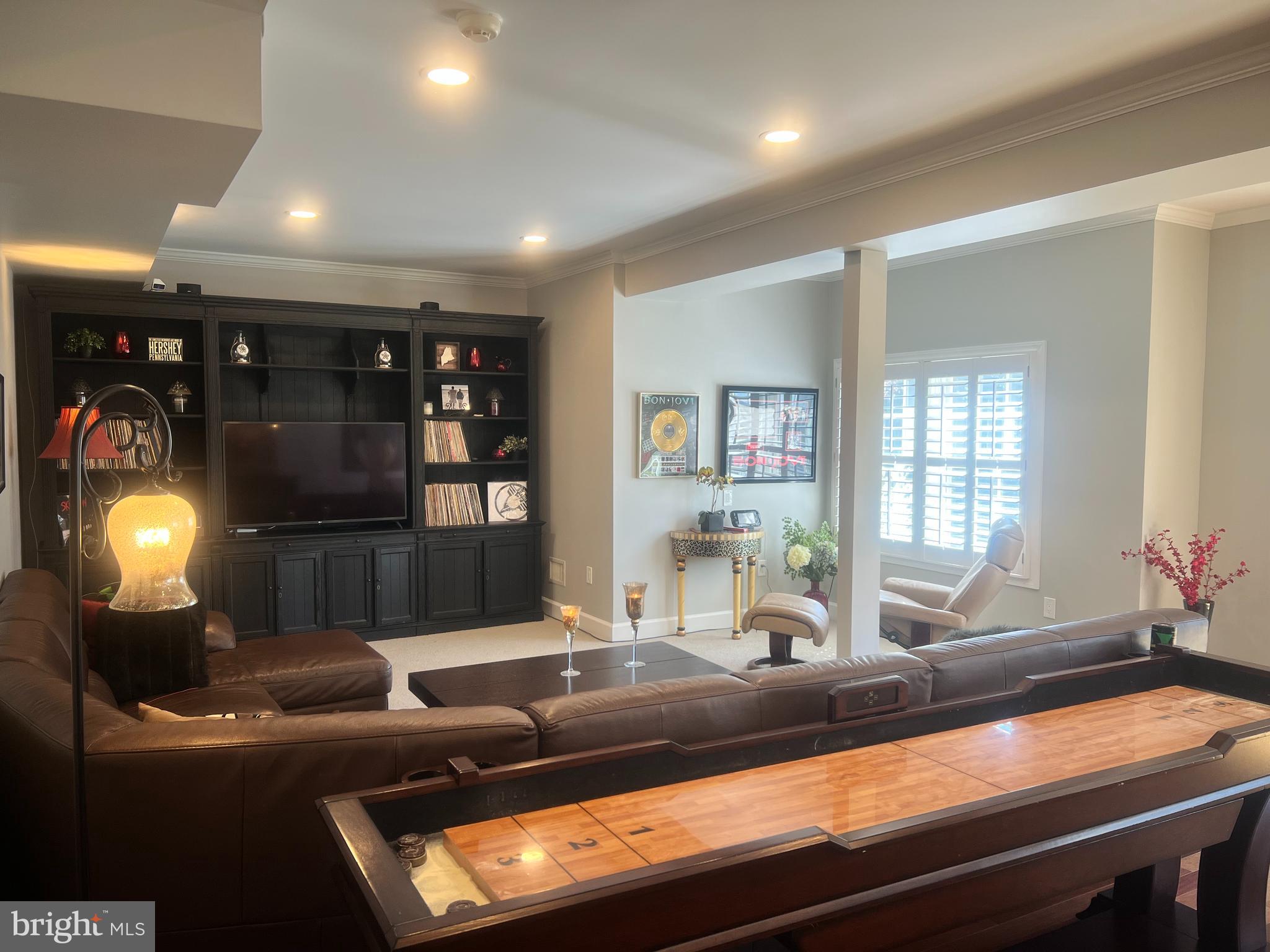 10306 Church Hill Road Myersville, MD 21773 - Photo 36 of 81 a living room with furniture and a lamp