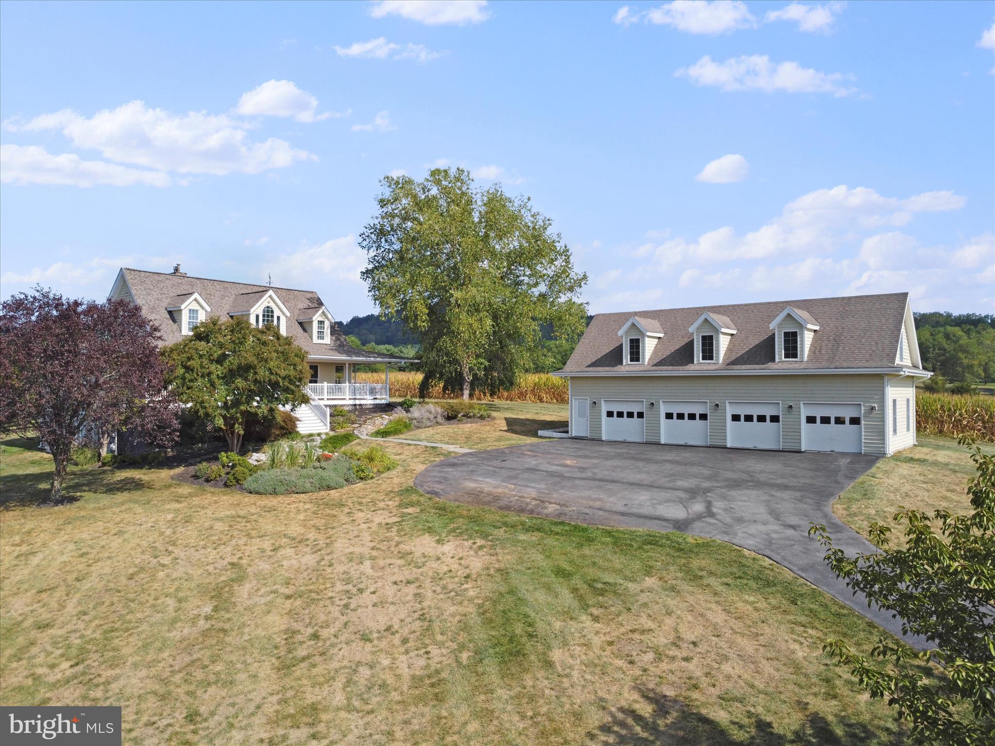 10306 Church Hill Road Myersville, MD 21773 - Photo 48 of 81 a view of a house with a yard and sitting area