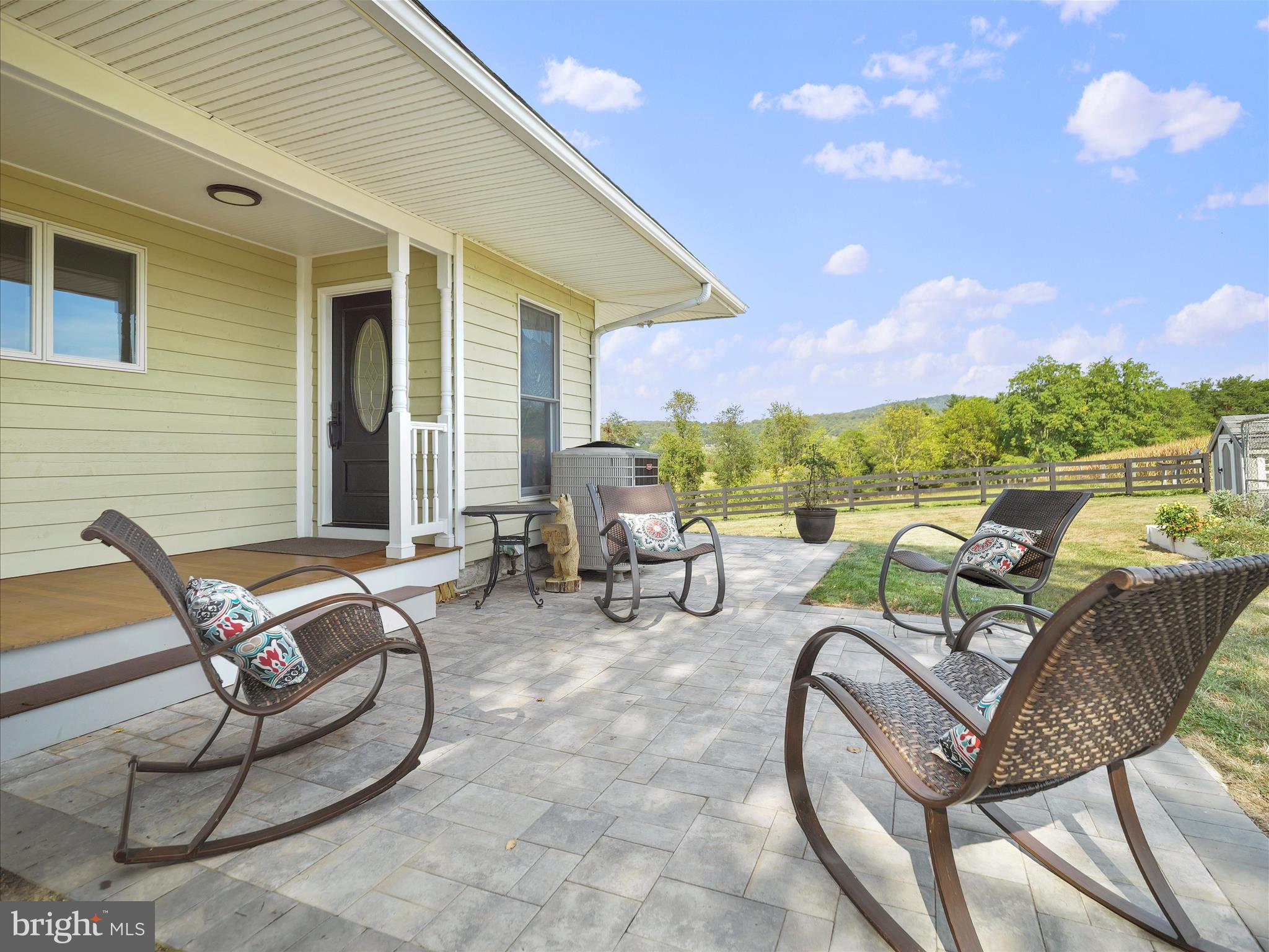 10306 Church Hill Road Myersville, MD 21773 - Photo 53 of 81 a view of a patio with table and chairs and potted plants