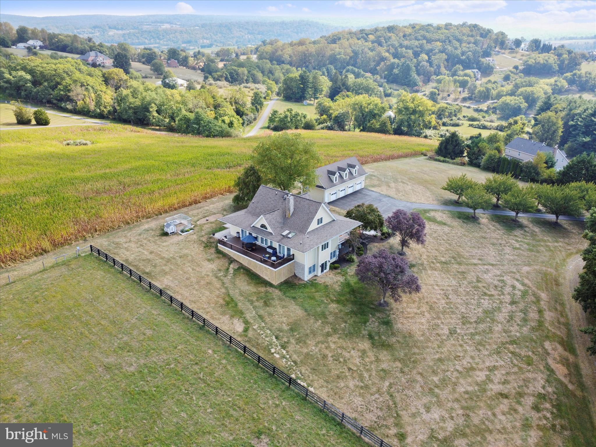 10306 Church Hill Road Myersville, MD 21773 - Photo 71 of 81 an aerial view of a house with a garden and lake view