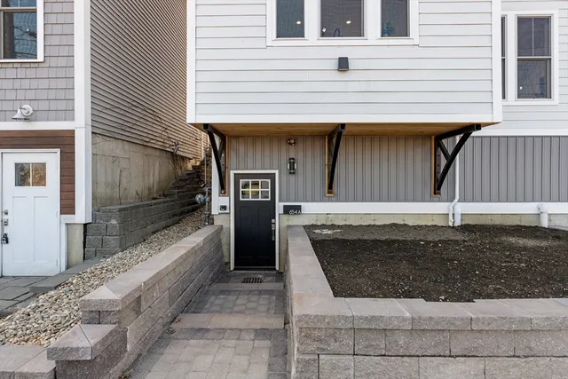 a front view of a building with street view