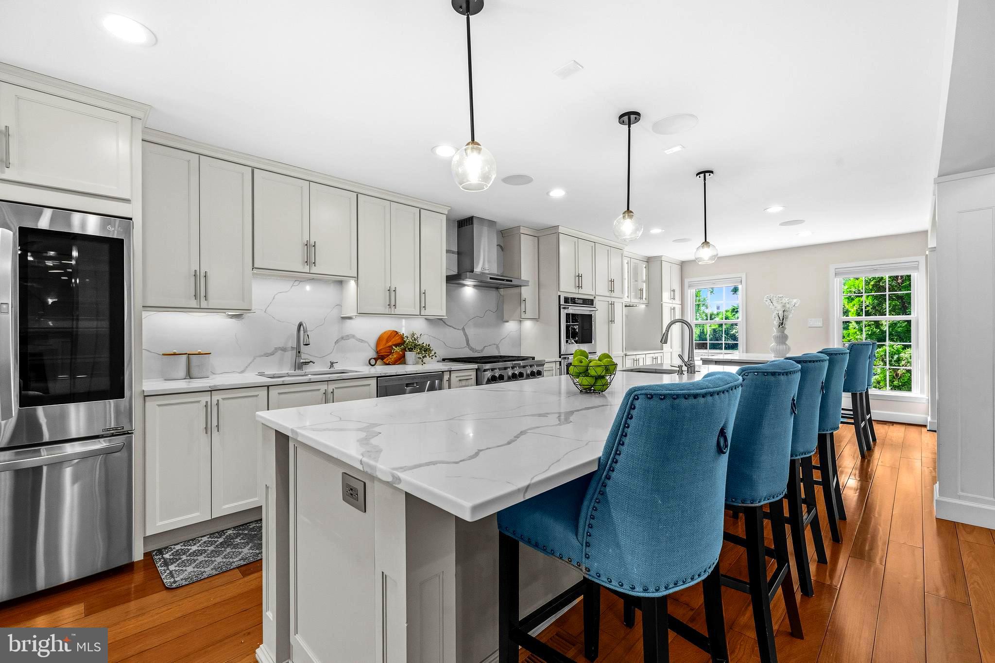 4007 West Braddock Road Alexandria, VA 22304 - Photo 14 of 52 a view of kitchen with sink dining table and chairs