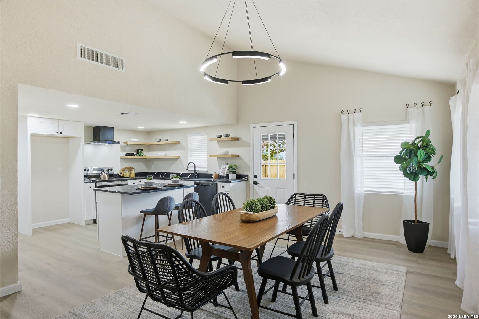 13403 Centerbrook Universal City, TX 78148 - Photo 15 of 30 a view of a dining room with furniture and chandelier
