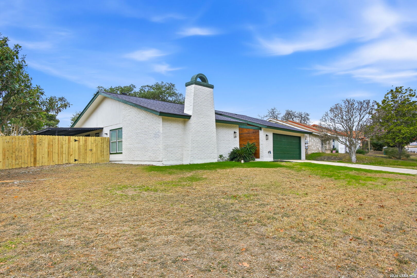 13403 Centerbrook Universal City, TX 78148 - Photo 2 of 30 a house view with a backyard space