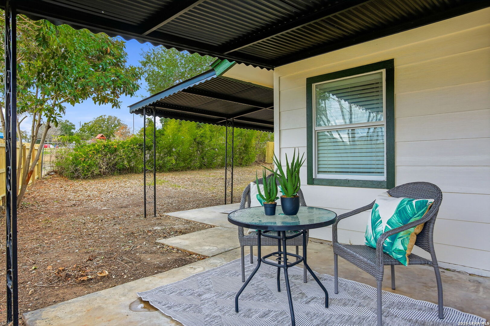 13403 Centerbrook Universal City, TX 78148 - Photo 25 of 30 a backyard of a house with table and chairs