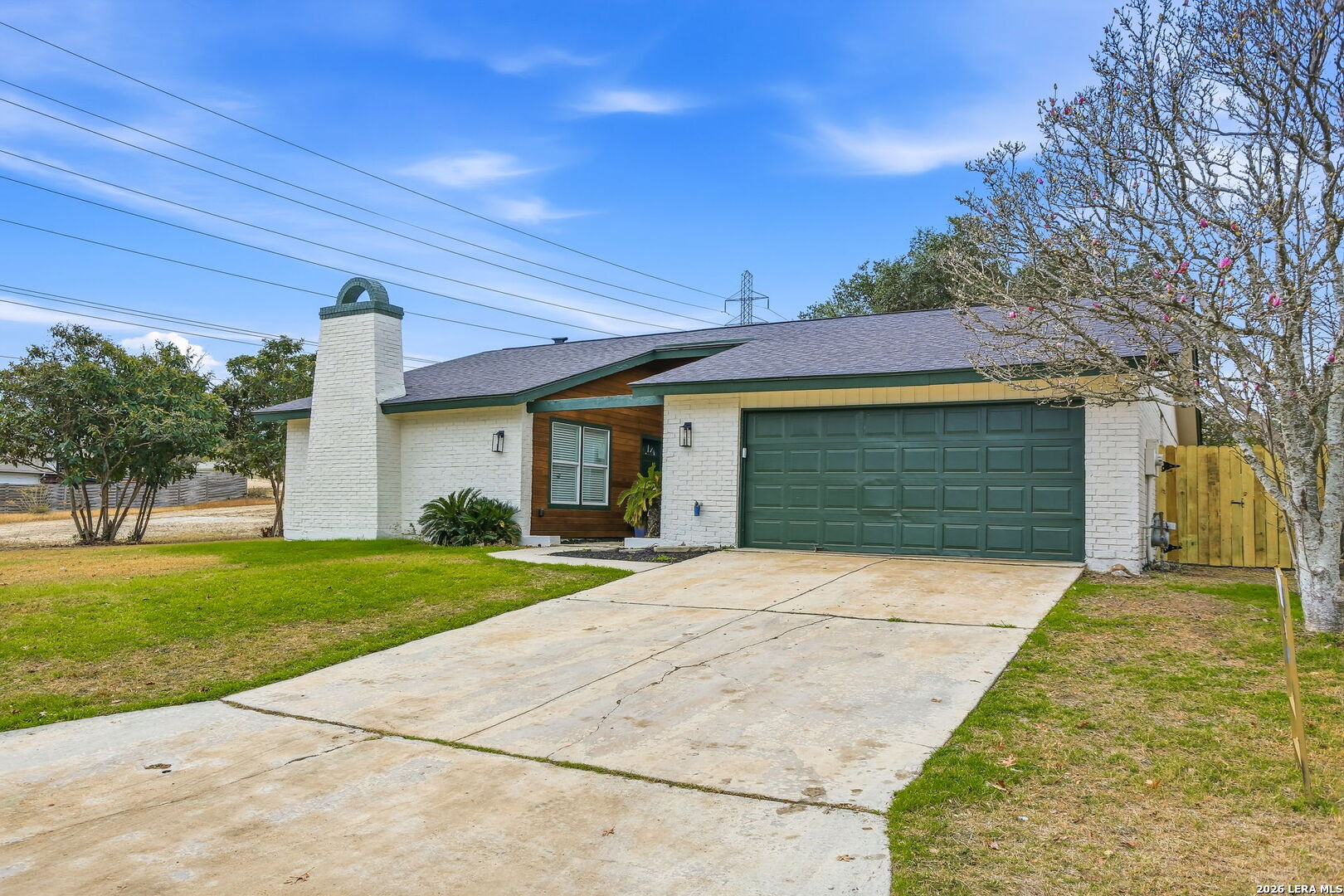13403 Centerbrook Universal City, TX 78148 - Photo 3 of 30 a front view of a house with a yard and trees