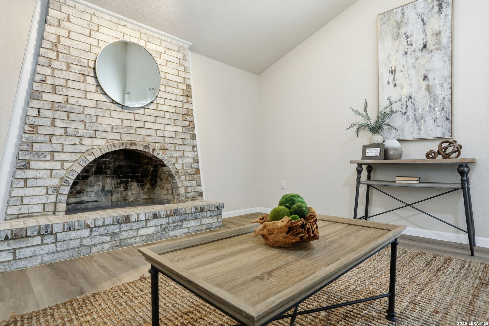13403 Centerbrook Universal City, TX 78148 - Photo 9 of 30 a living room with furniture and a fireplace