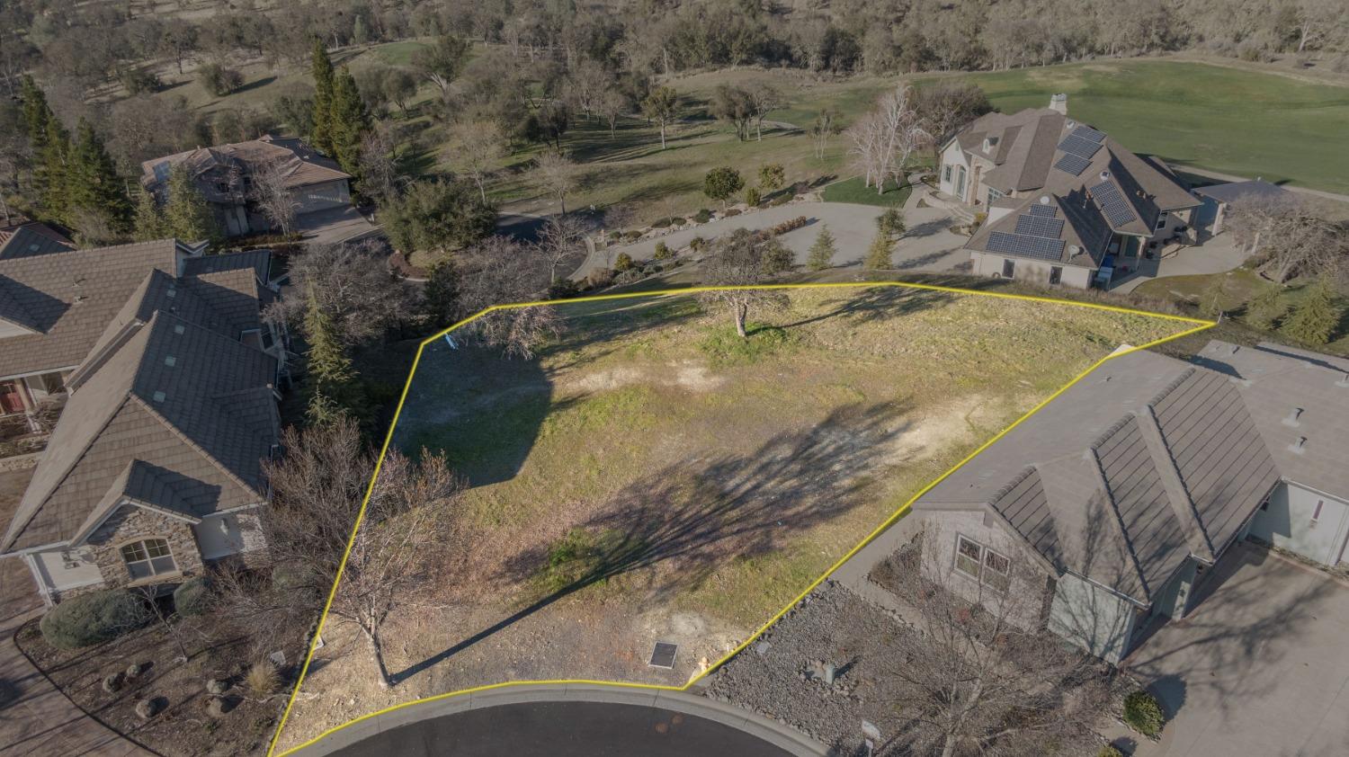 186 Leaf Crest Court Copperopolis, CA 95228 - Photo 14 of 24 a view of a backyard with wooden fence