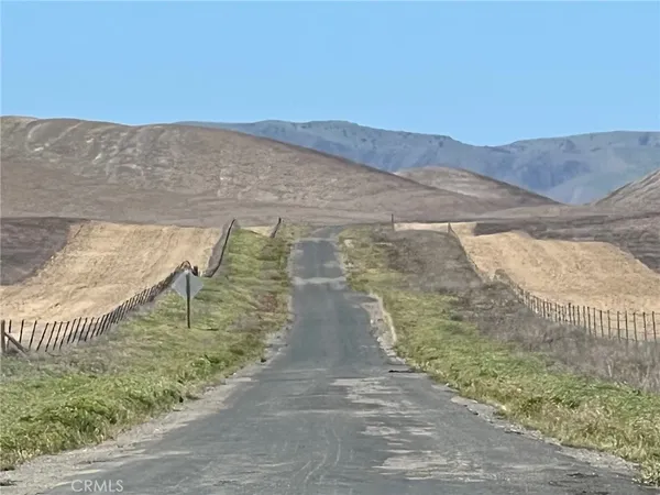 a view of street and mountains