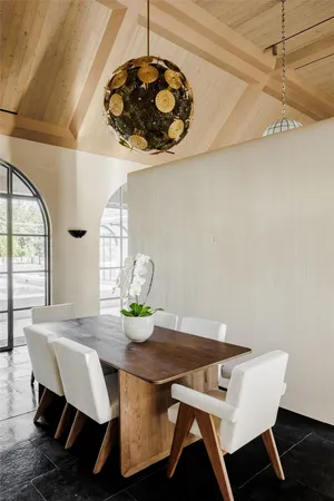 a kitchen with a stove and a table