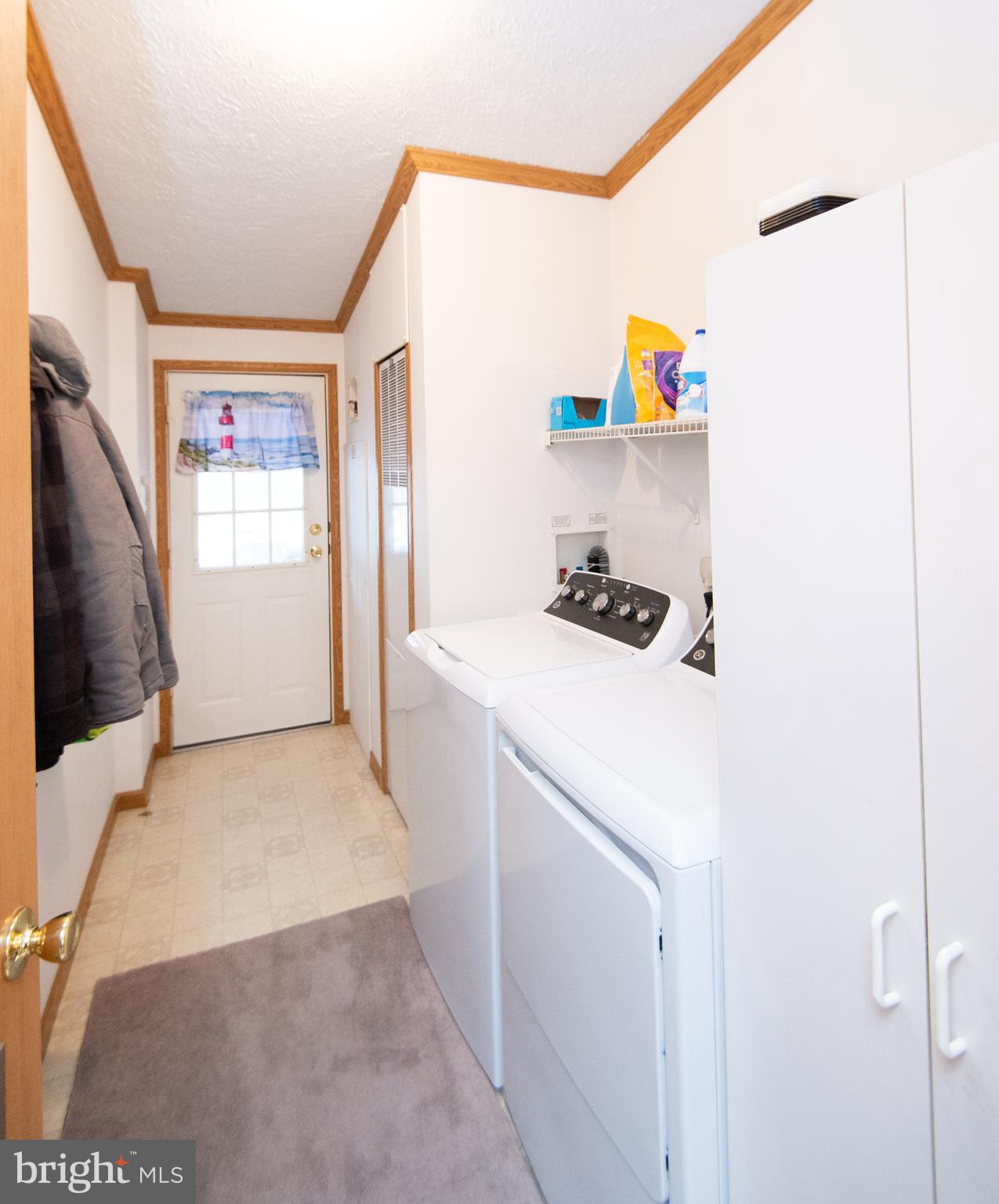 5622 Ross Neck Road Cambridge, MD 21613 - Photo 12 of 42 a room with storage and utility