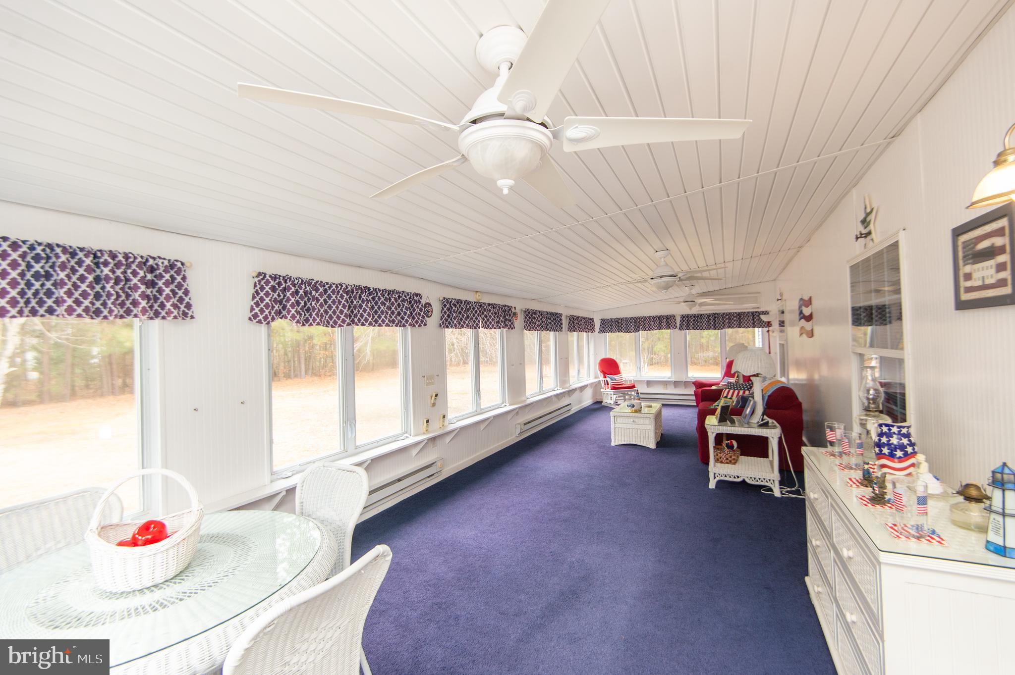 5622 Ross Neck Road Cambridge, MD 21613 - Photo 17 of 42 a very nice looking room with a large window