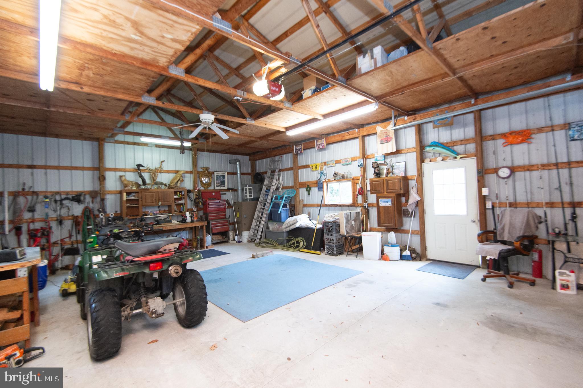 5622 Ross Neck Road Cambridge, MD 21613 - Photo 40 of 42 a view of a storage room with lots of stuff