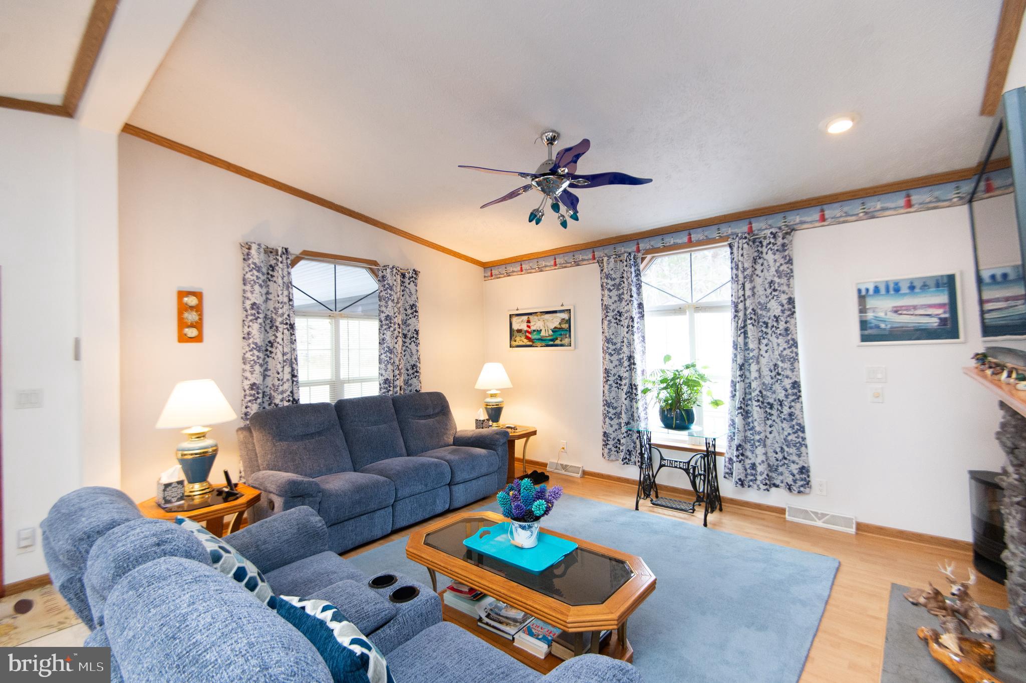 5622 Ross Neck Road Cambridge, MD 21613 - Photo 5 of 42 a living room with furniture and wooden floor