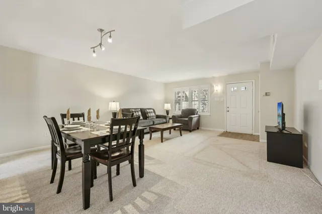 a view of a livingroom and dining room