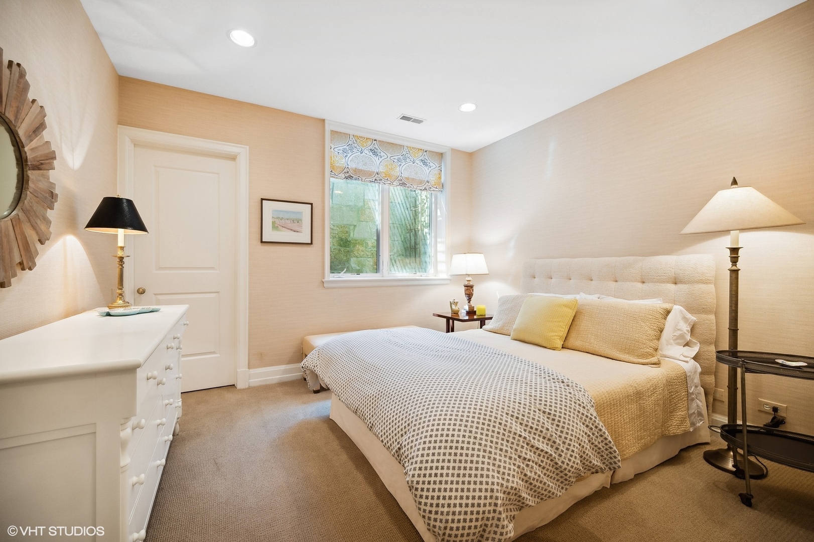 1024 Westmoor Road Winnetka, IL 60093 - Photo 33 of 38 a bedroom with a bed and a chandelier