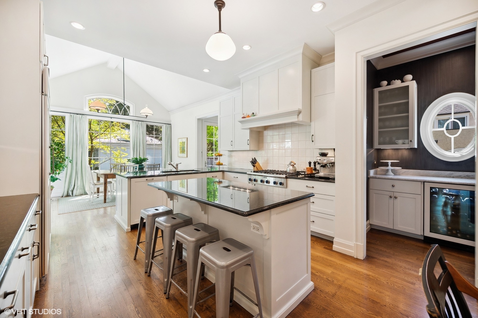 1024 Westmoor Road Winnetka, IL 60093 - Photo 10 of 38 a kitchen with sink cabinets and wooden floor