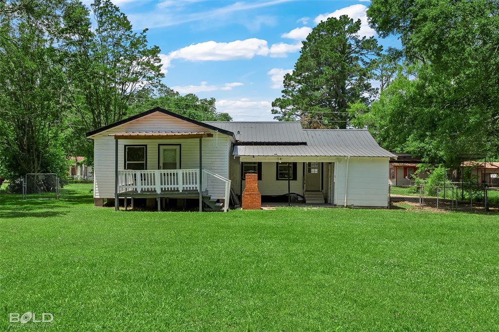 115 Pam Street Mansfield, LA 71052 - Photo 25 of 25 a view of a house with a yard