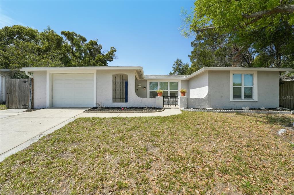 front view of a house with a yard