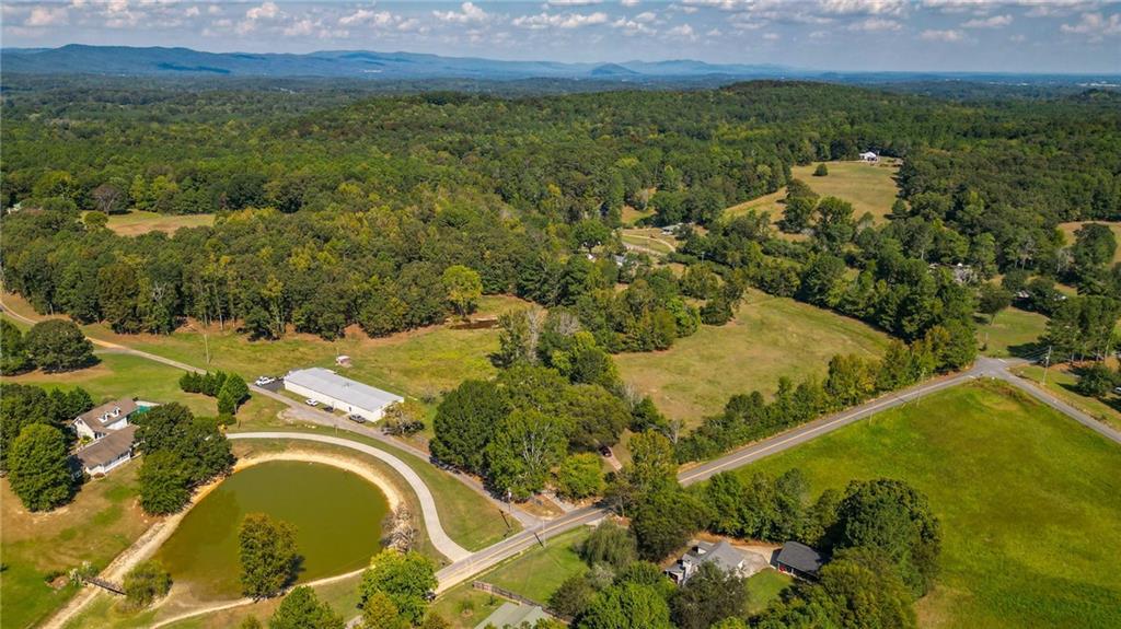 a view of a lake with a yard