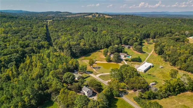 a view of a yard with an ocean