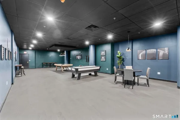 a view of a big room with lounge chair