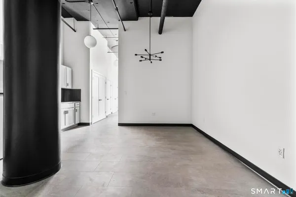 a view of a hallway with closet