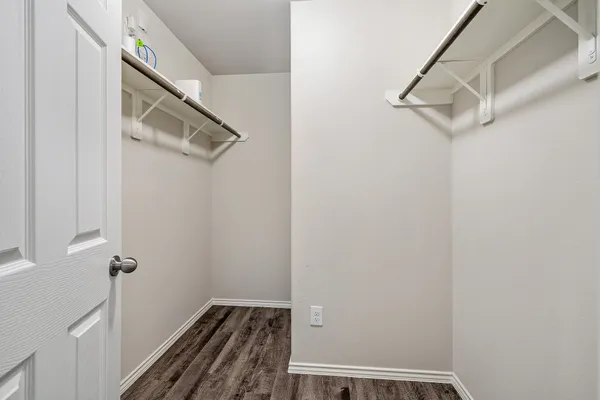 a view of a room with racks on the wall