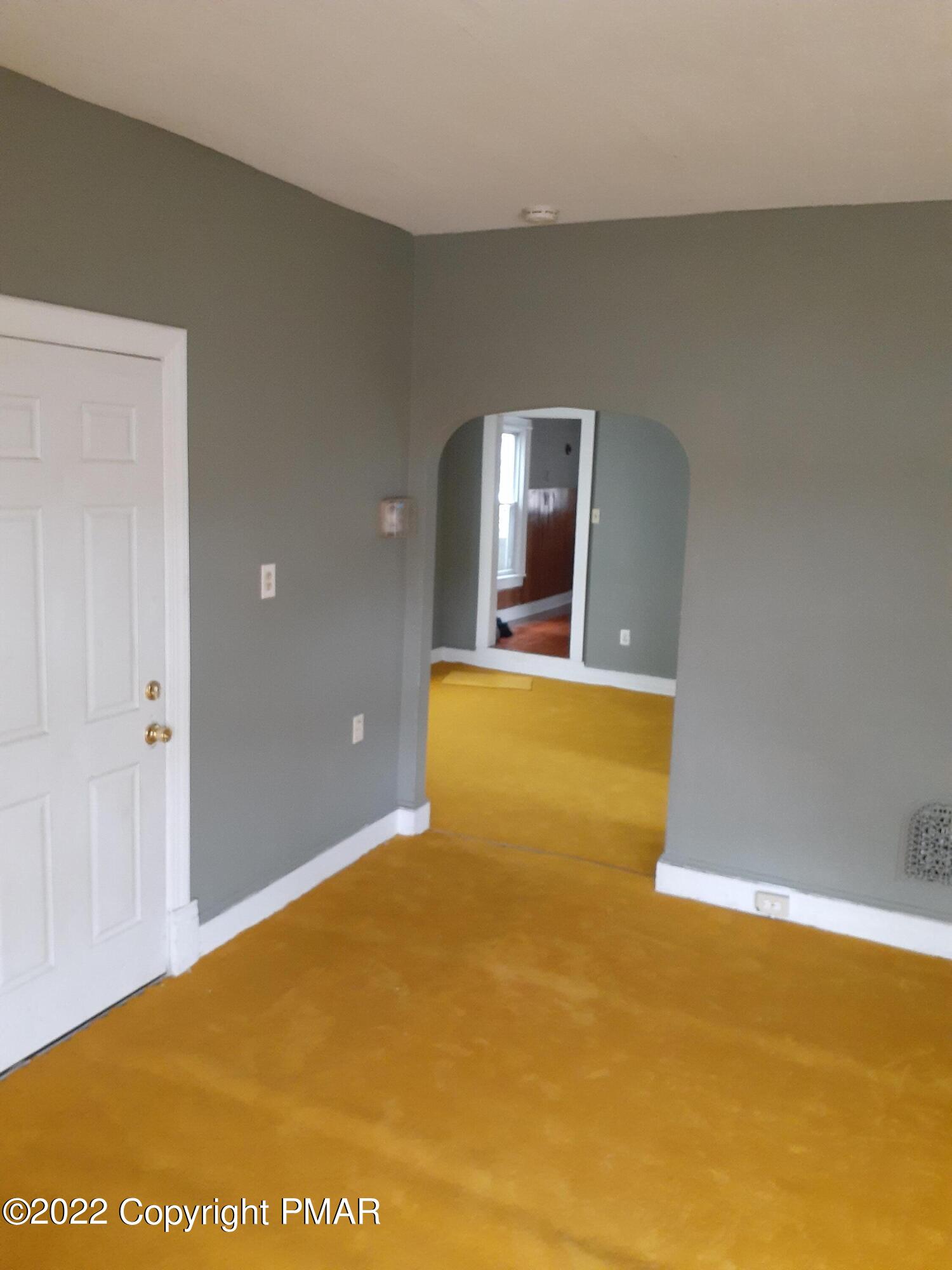 218 Ferdinand Street Scranton, PA 18508 - Photo 2 of 11 a view of a big room with windows