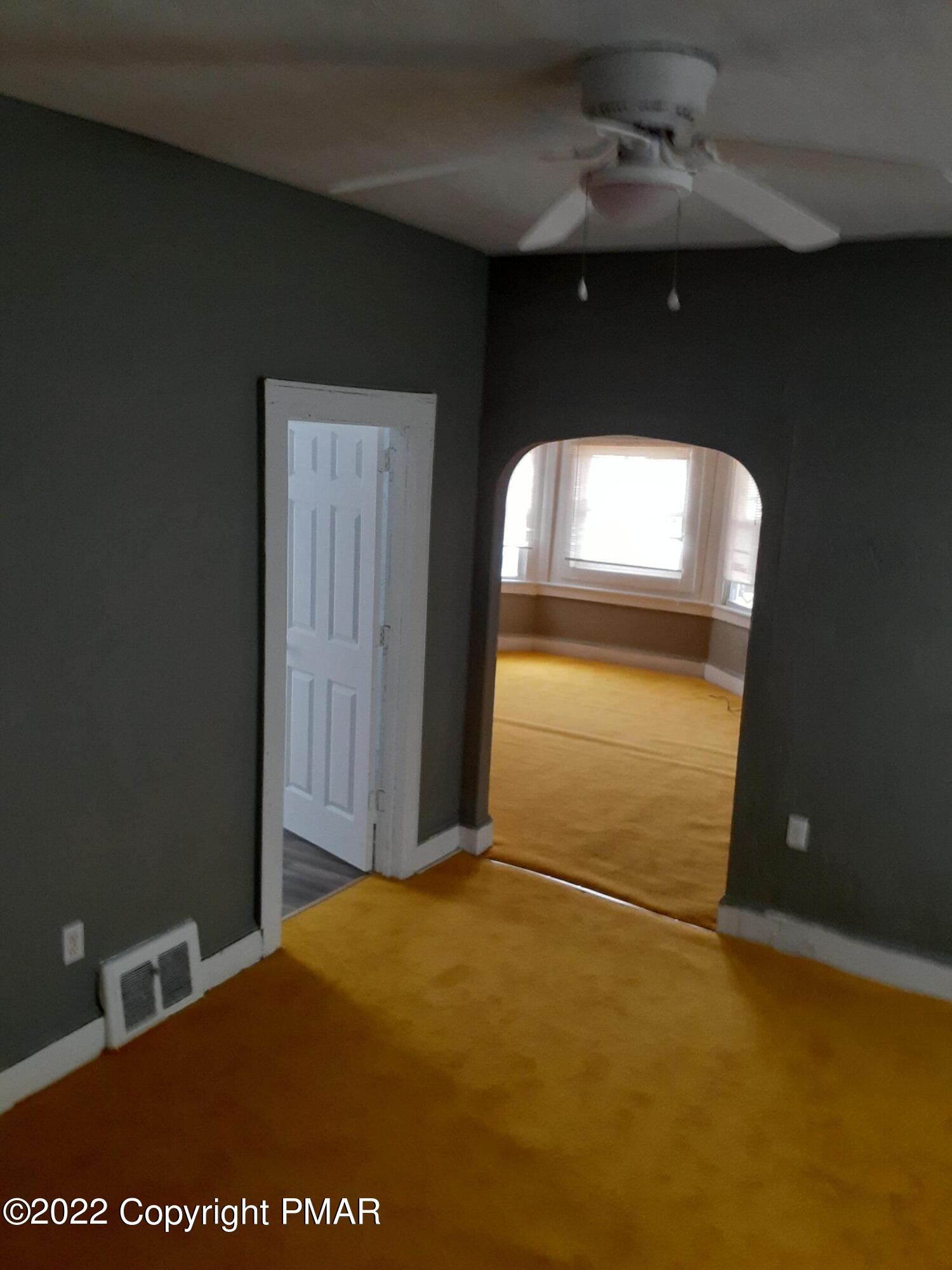 218 Ferdinand Street Scranton, PA 18508 - Photo 3 of 11 a view of empty room with window