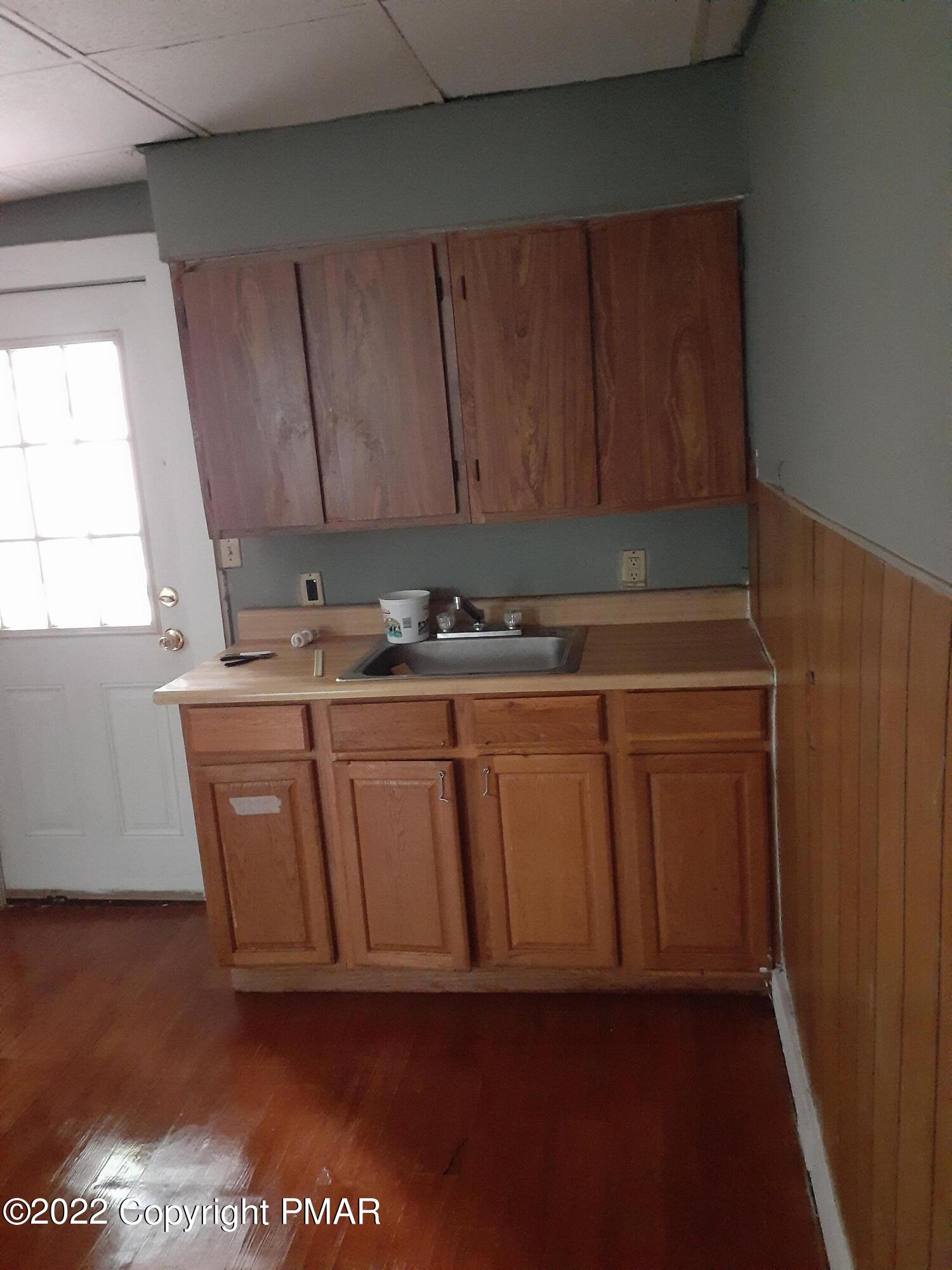 218 Ferdinand Street Scranton, PA 18508 - Photo 6 of 11 a room with storage and utility