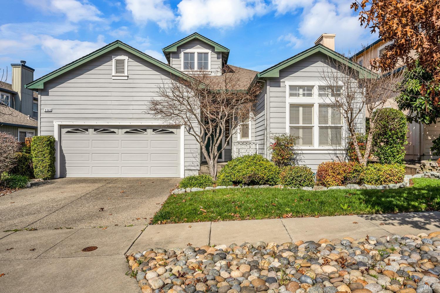 front view of a house and a yard