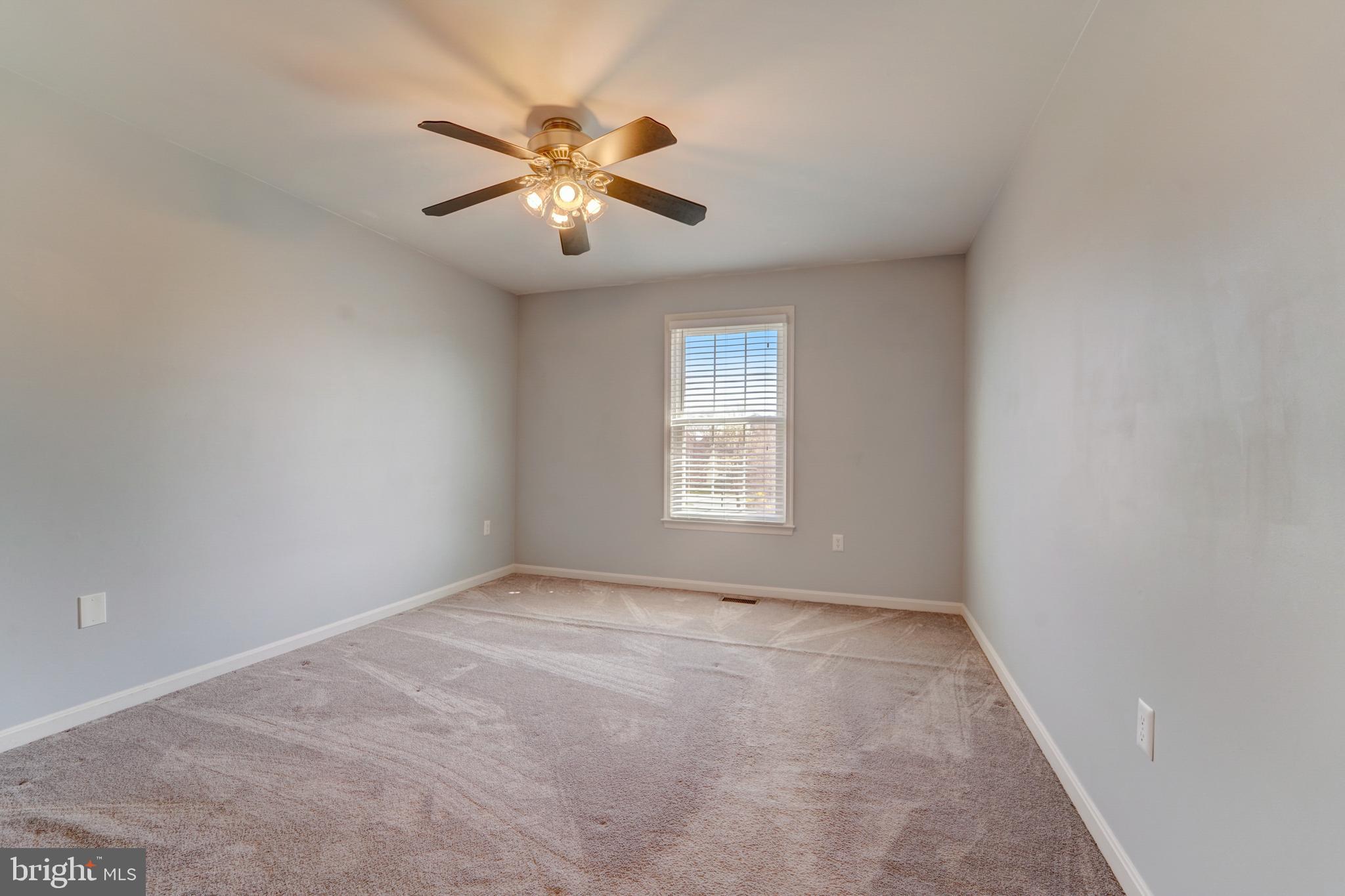 11604 Admiral Court Laurel, MD 20708 - Photo 23 of 46 bedroom #3, also with a ceiling fan