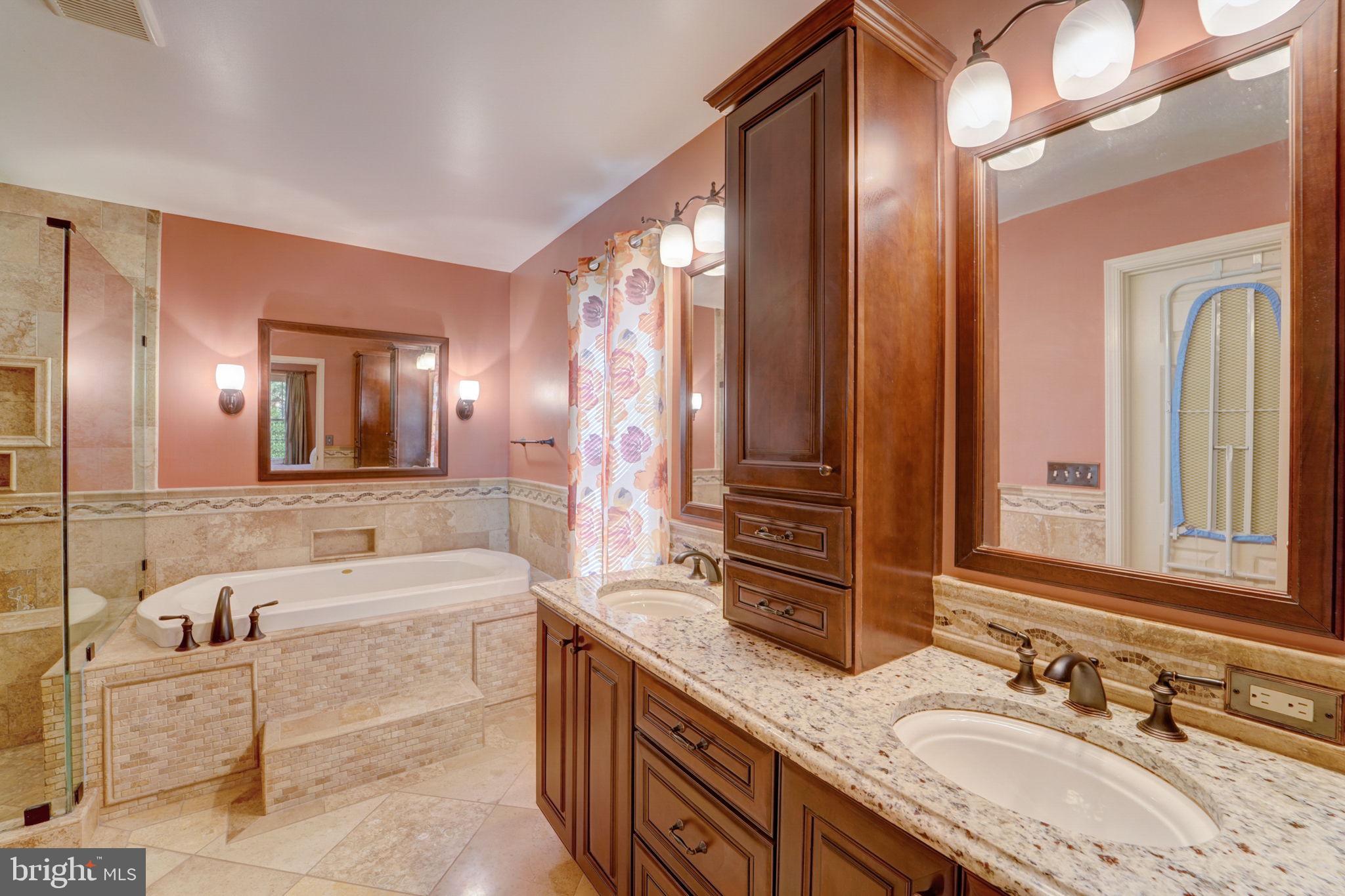 11604 Admiral Court Laurel, MD 20708 - Photo 29 of 46 Master bath w/ soaking tub & lot of cabinets