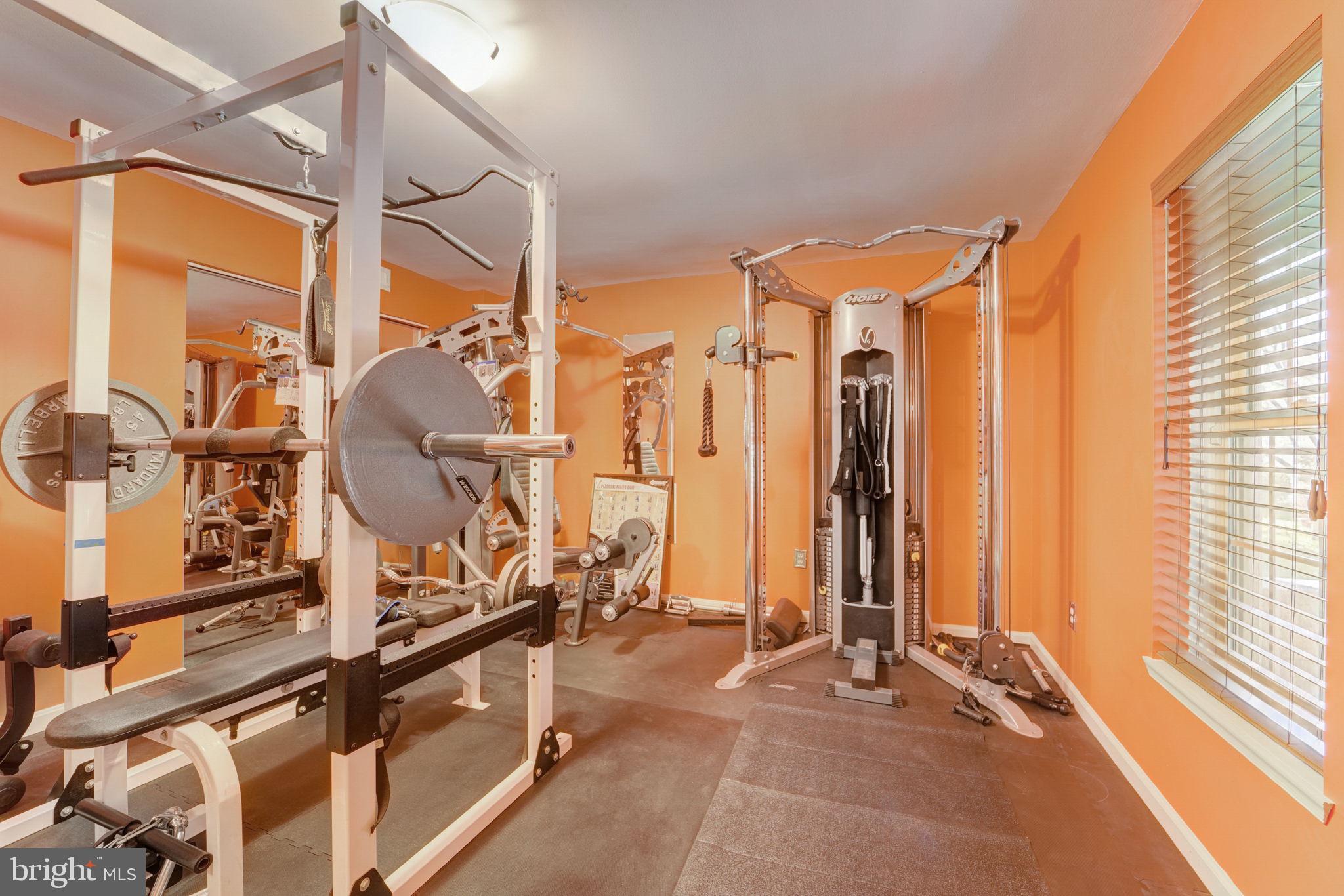 11604 Admiral Court Laurel, MD 20708 - Photo 37 of 46 Gym floor matts are left for the buyer