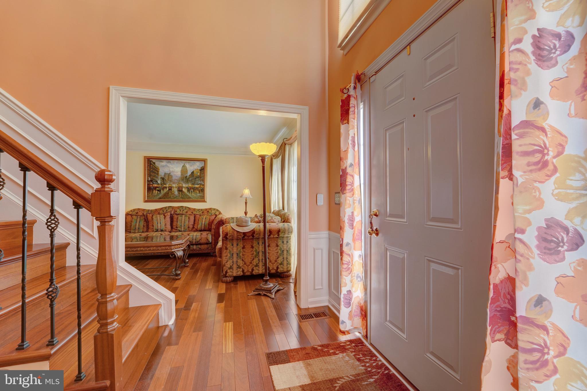 11604 Admiral Court Laurel, MD 20708 - Photo 5 of 46 2 story front hallway means very lighted entry