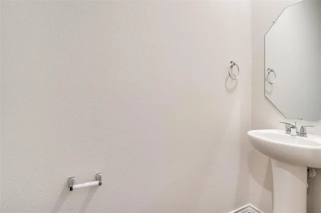 a kitchen with stainless steel appliances a sink dishwasher stove refrigerator and microwave