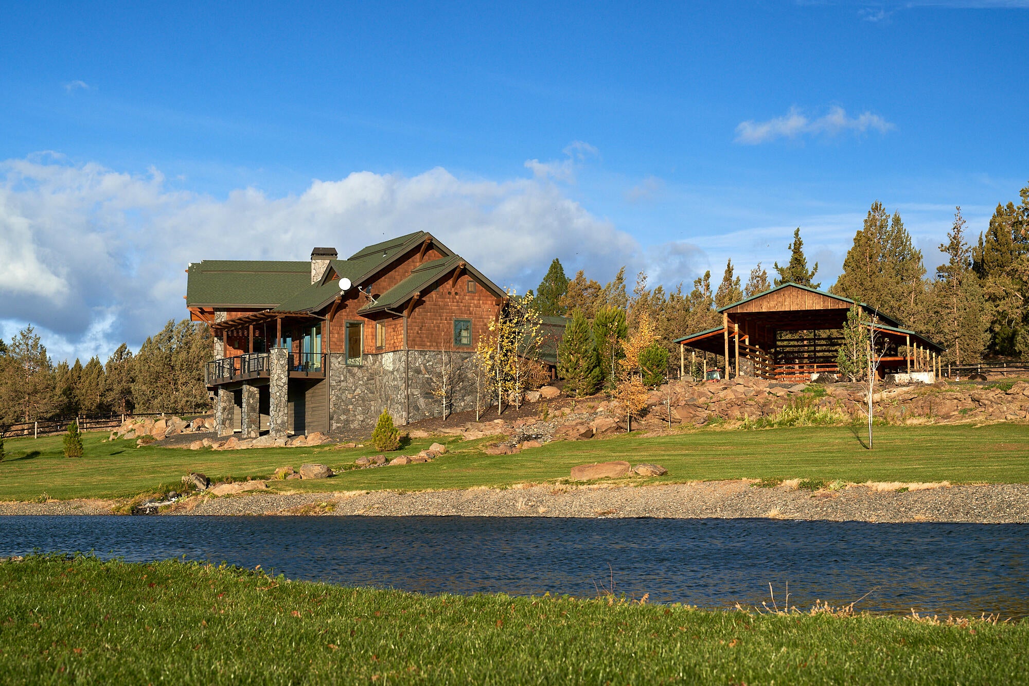 19525 Innes Market Road Bend, OR 97703 - Photo 18 of 56 The view of the Main home from the pond.
