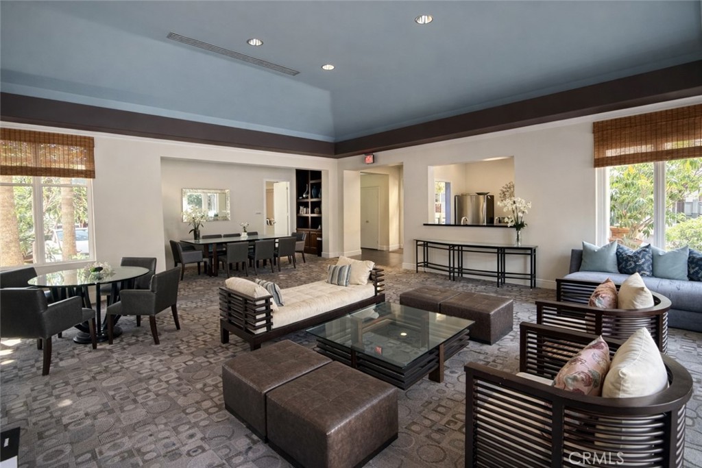 2253 Martin, Unit 107 Irvine, CA 92612 - Photo 11 of 17 a living room with furniture and a large window
