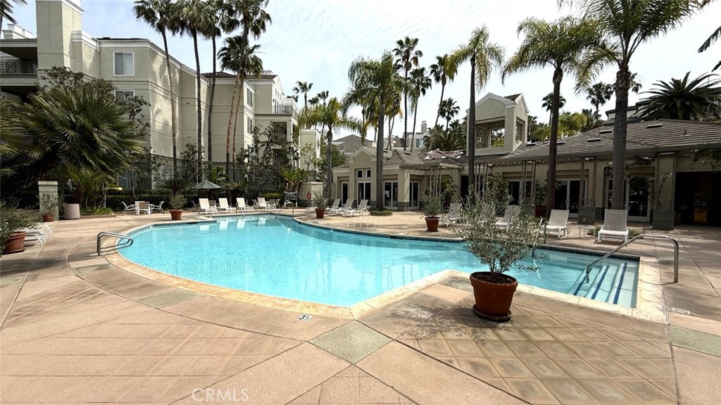 2253 Martin, Unit 107 Irvine, CA 92612 - Photo 14 of 17 a view of a swimming pool with outdoor seating